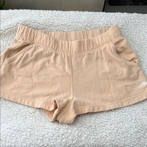 The North Face Peach Shorts with White Embroidered Logo